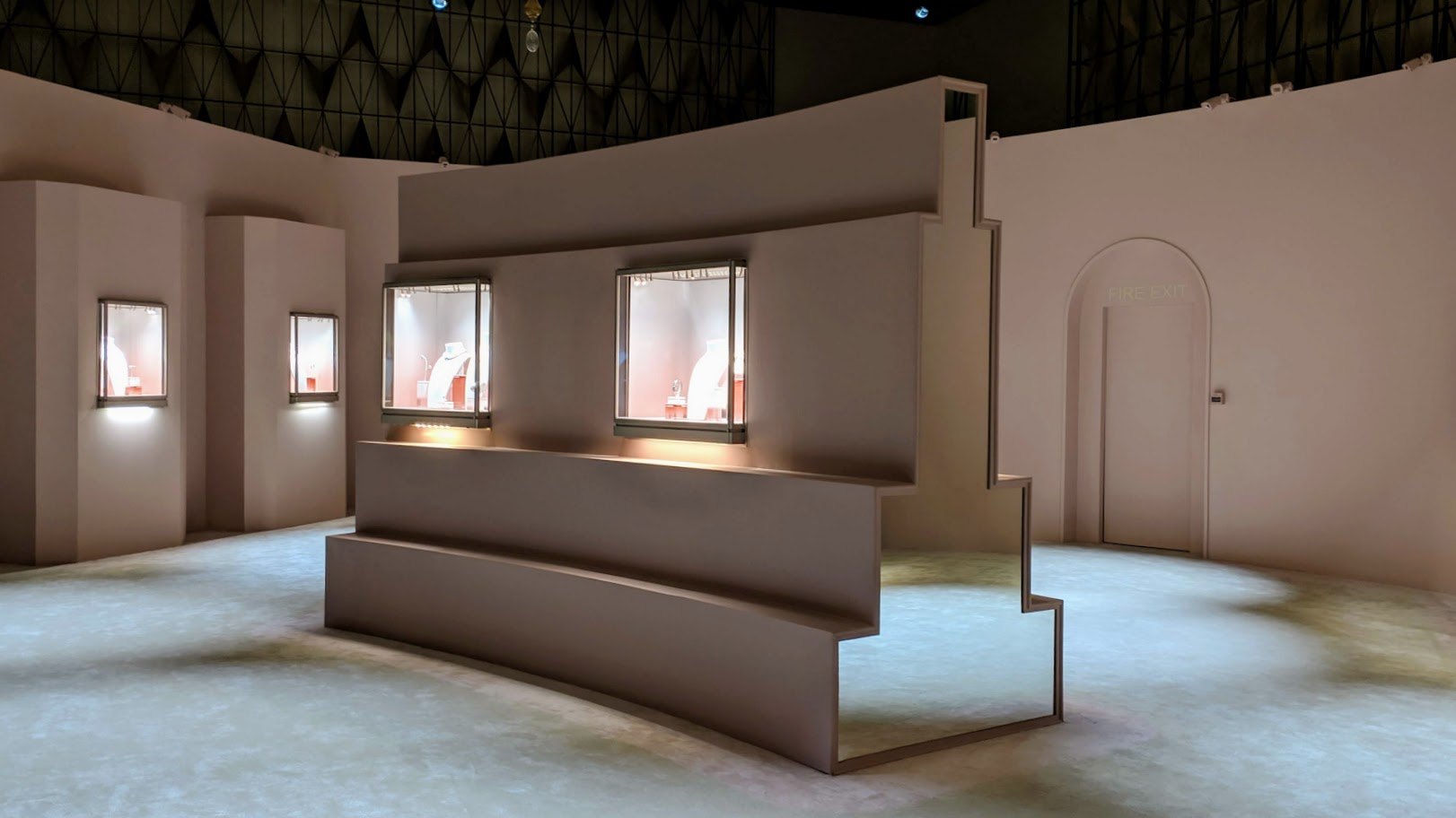 Neutral gallery environment with display vitrines
